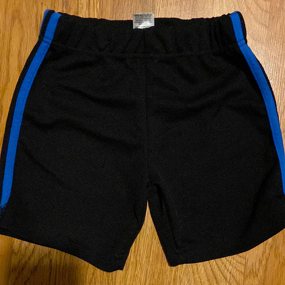 Blue and black basketball shorts